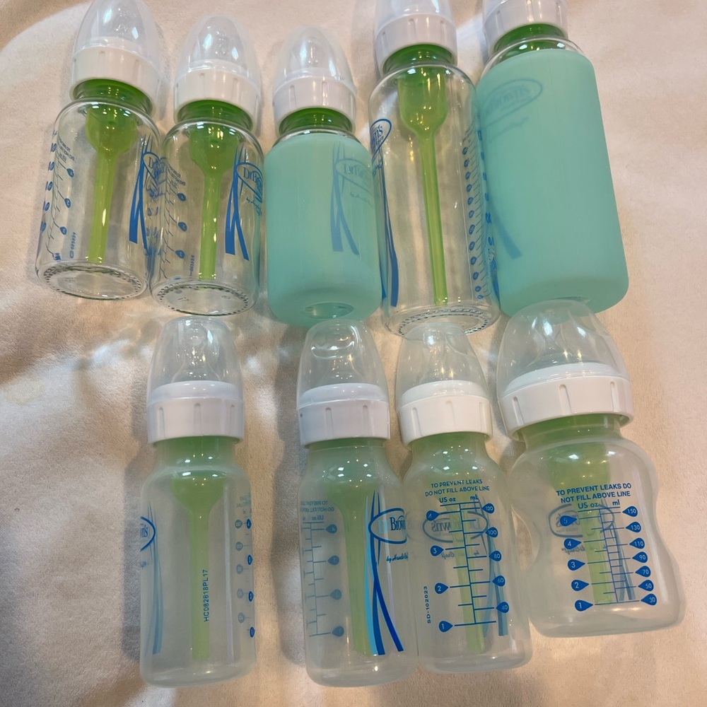 Set of Baby Bottles with Green Accents